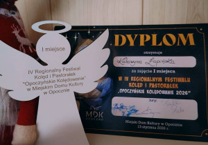 Dyplom za zajęcie I - go miejsca w IV Regionalnym Festiwalu Kolęd i Pastorałek „Opoczyńskie Kolędowanie 2026”