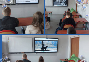 Uczniowie oglądają na ekranie multimedialnym prezentację dotyczącą Międzynarodowego Dnia Niewidomych